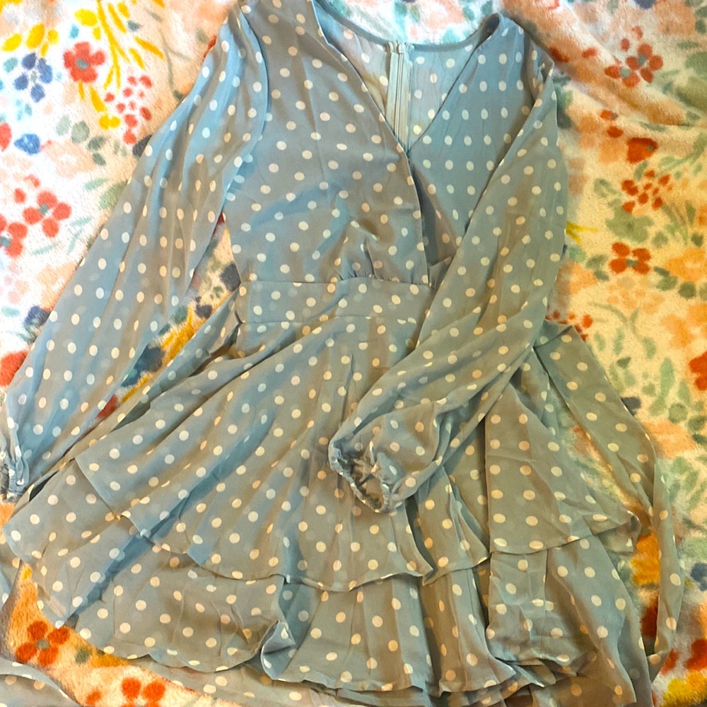 Blue poke a dot short dress. V neck with bow in the back